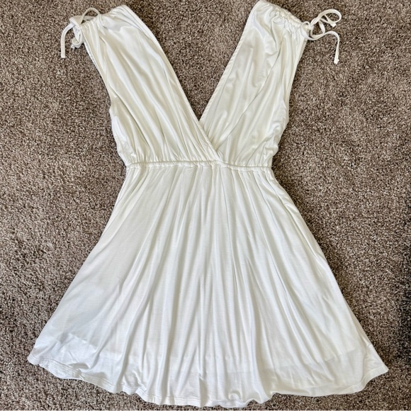 Lulus Dresses & Skirts - Lulus Café Day White Surplice Mini Dress NWOT Pockets
